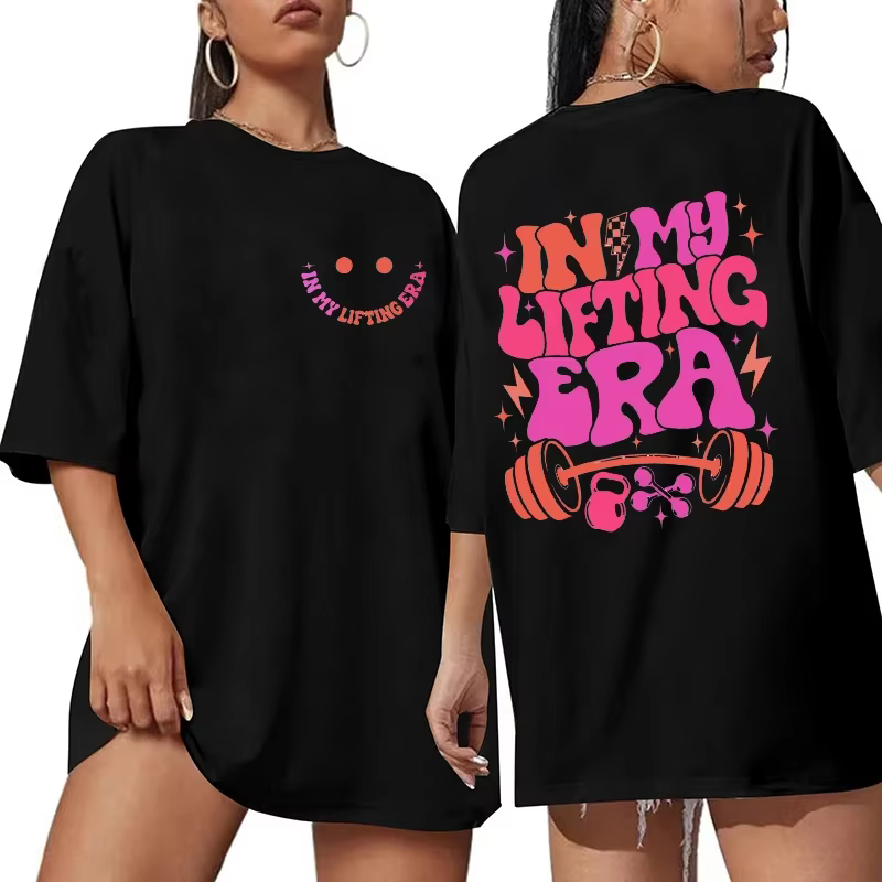 T-shirt « Be Happy Lift Heavy » pour femme – Haut graphique amusant pour l'entraînement et la musculation – T-shirts à manches courtes pour maman sportive – Vêtements féminins