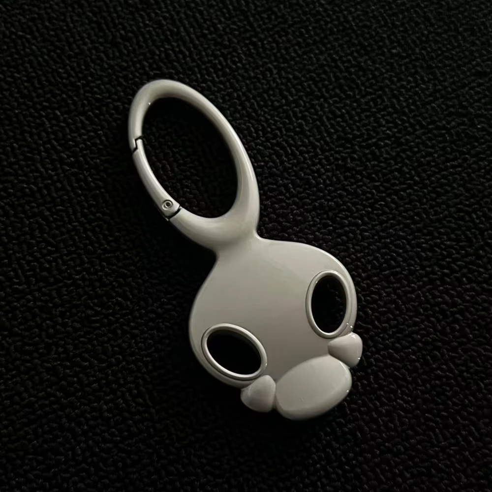 Porte-clés de voiture personnalisé et Unique, caractéristiques faciales, sensation haut de gamme, sac de taille en métal tridimensionnel, accessoires suspendus
