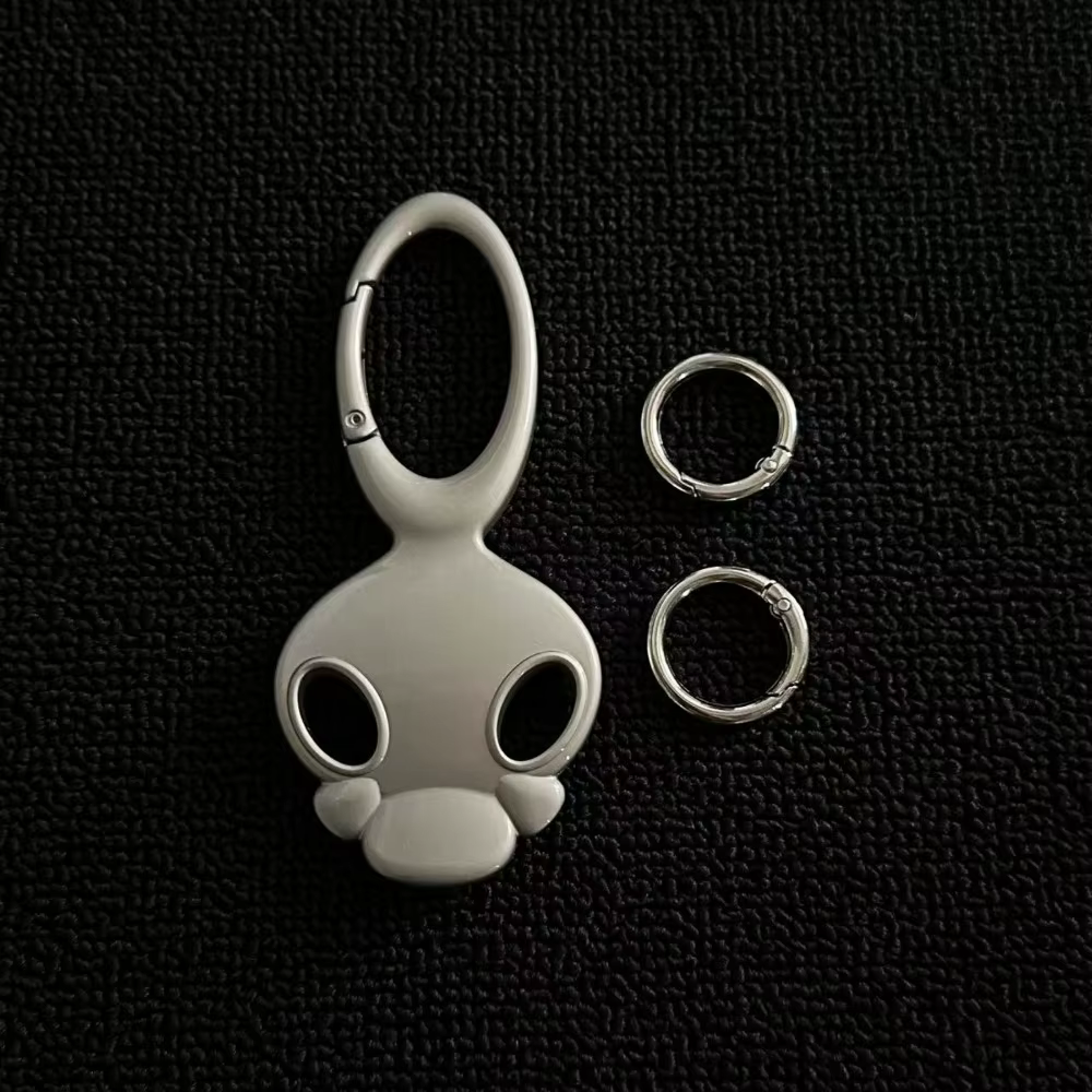 Porte-clés de voiture personnalisé et Unique, caractéristiques faciales, sensation haut de gamme, sac de taille en métal tridimensionnel, accessoires suspendus