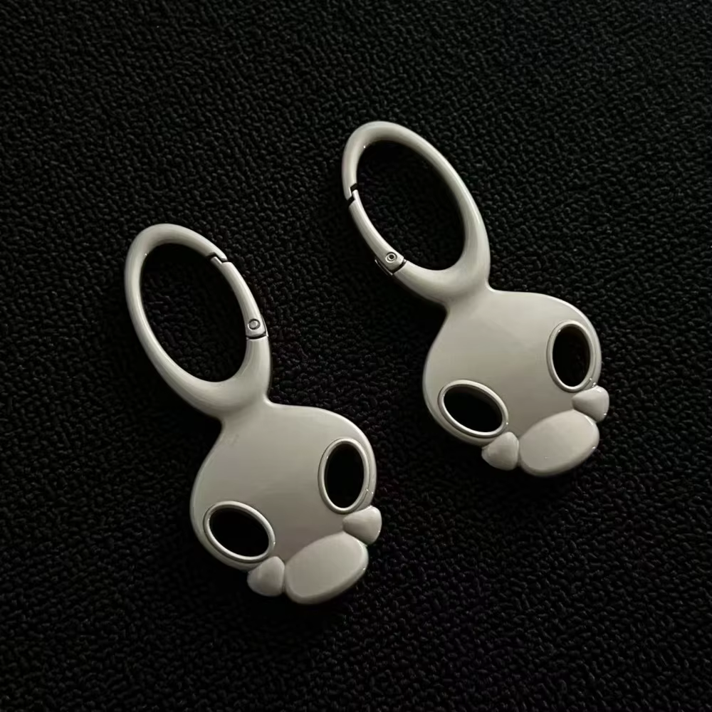 Porte-clés de voiture personnalisé et Unique, caractéristiques faciales, sensation haut de gamme, sac de taille en métal tridimensionnel, accessoires suspendus