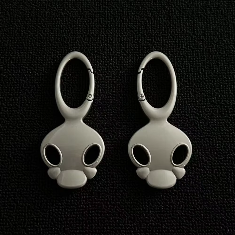 Porte-clés de voiture personnalisé et Unique, caractéristiques faciales, sensation haut de gamme, sac de taille en métal tridimensionnel, accessoires suspendus